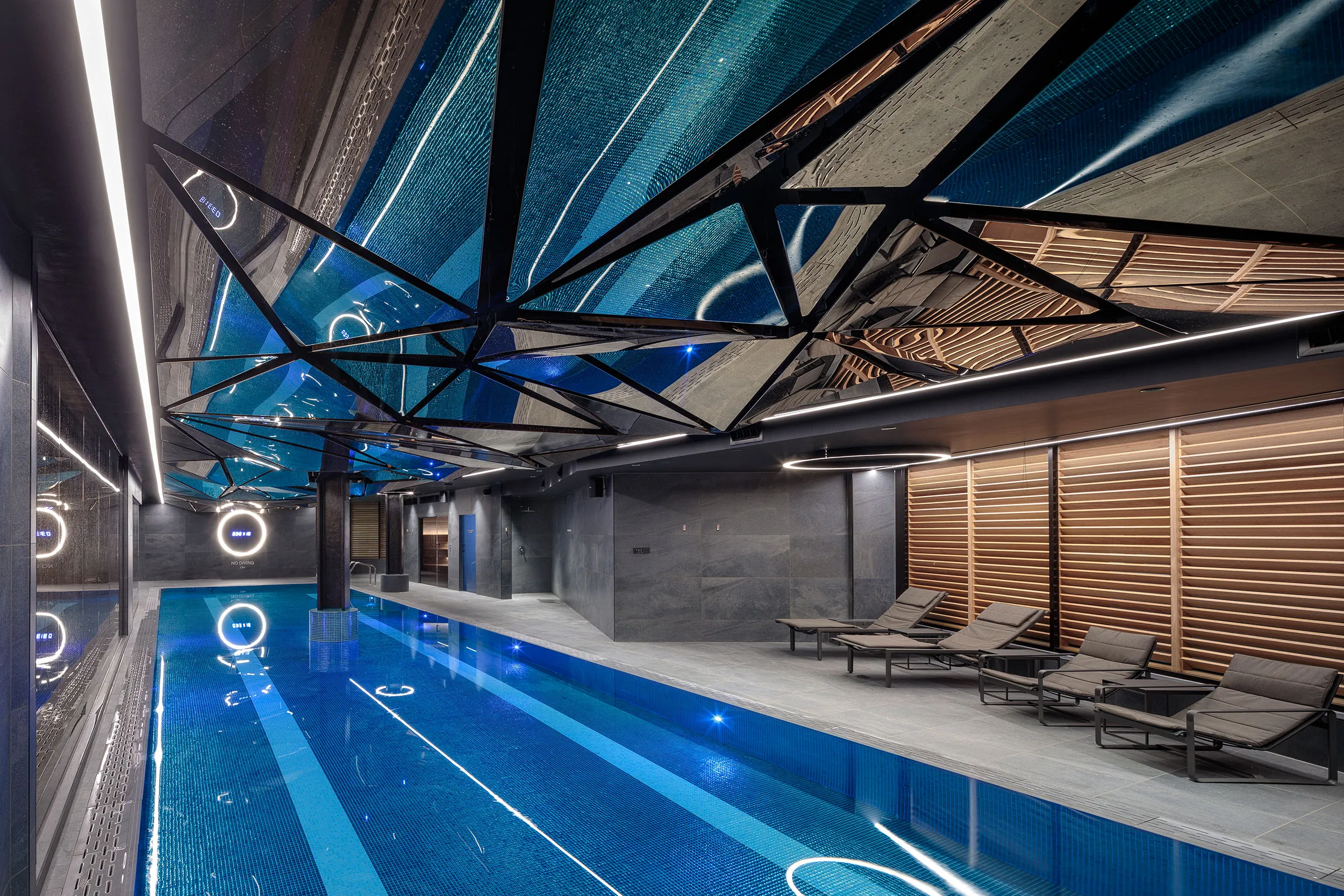 Clean indoor swimming pool inside a commercial facility